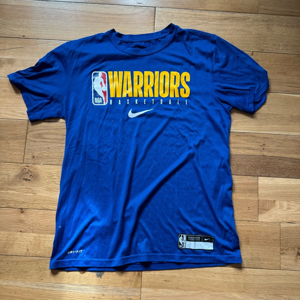 Nike Warriors NBA DRI FIT shirt medium
Fits like a small
Golden state Warriors